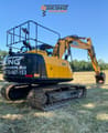 2019 JCB JS131LC excavator rear three-quarter view