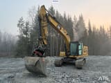 2018 Caterpillar 323-07A crawler excavator, front three-quarter view