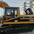 2024 Caterpillar 320BL crawler excavator side view