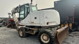 2005 CASE WX165 wheel excavator, rear three-quarter view
