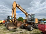 1997 CASE 588-P wheel excavator, front three-quarter view