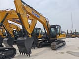 2026 XCMG XE215C Crawler Excavator with a detailed view of the boom and arm assembly, including the XCMG branding.