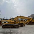 2000 Caterpillar 320B crawler excavator, side view