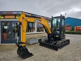 2025 Sany SY35U WE1655 Mini Excavator with yellow body, featuring the front dozer blade in a lowered position.