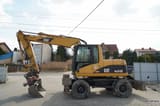 2003 Caterpillar M313C wheel excavator, side view