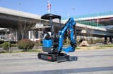 2026 Rippa R13 PRO Mini Excavator with a bright blue body, showcasing the full machine from a three-quarter front view.