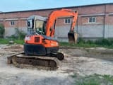 2023 Hitachi ZX55UR excavator, rear three-quarter view