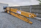 2025 Caterpillar CAT Crawler Excavator long reach boom and arm components with visible hydraulic lines and pins.