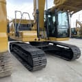 2024 Caterpillar 320GC crawler excavator, rear three-quarter view