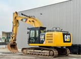 2012 Caterpillar 329E crawler excavator, side view