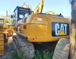 2023 Caterpillar 325C crawler excavator rear three-quarter view