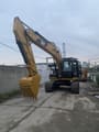 2015 Caterpillar 320D гусеничный экскаватор, вид спереди под углом