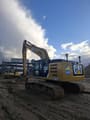 2013 Caterpillar 329E crawler excavator, rear three-quarter view