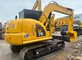 2024 Komatsu PC70-8 mini excavator, rear three-quarter view