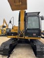 2024 Caterpillar 312 crawler excavator, front view