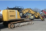2012 Caterpillar 320E crawler excavator, side view