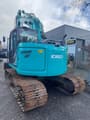 2018 Kobelco SK140SRLC-5 crawler excavator, rear three-quarter view