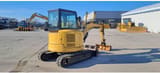 2021 Caterpillar 303.5E crawler excavator, rear three-quarter view