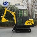 2026 Rippa R330 Mini Excavator from the side, highlighting the black rubber tracks and the yellow main body.