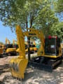2024 Komatsu PC70-8 mini excavator, front three-quarter view