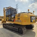 2023 Caterpillar 323D2L crawler excavator, rear three-quarter view