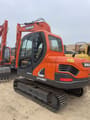 2021 Doosan DX80 crawler excavator, rear three-quarter view