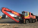2000 O&K MH 6.5 wheel excavator, side profile view