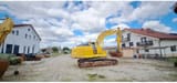 Komatsu PC210LC-10 crawler excavator, rear three-quarter view