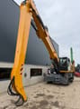 2022 Liebherr LH40 M material handler, rear three-quarter view