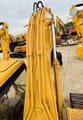 2015 Caterpillar 320B crawler excavator boom and hydraulic detail
