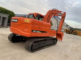 2021 Doosan DX140LC crawler excavator, rear three-quarter view