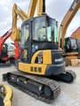 2023 Komatsu PC-55MR mini excavator, rear three-quarter view