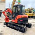 2021 Kubota U55-5 mini excavator, rear three-quarter view