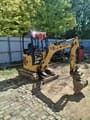 2021 Caterpillar 301.7 mini excavator, front three-quarter view