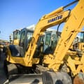 Komatsu PC55MR-5 mini excavator, side view