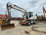 2009 Caterpillar M316D wheel excavator, side view
