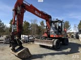 1997 O&K MH CITY wheeled excavator, front three-quarter view