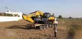2026 Sany SY240C-9HD Crawler Excavator with its boom and arm extended, loaded on a flatbed truck.