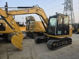 2025 Caterpillar 307E2 mini excavator, side view