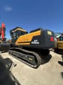 2024 Hyundai HX340HD crawler excavator, rear three-quarter view
