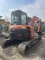 2023 Kubota U35 mini excavator, rear three-quarter view