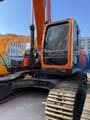 Doosan DX340LC-9C crawler excavator, front three-quarter view