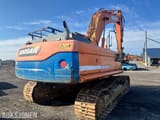 2010 Doosan DX300LC crawler excavator, rear three-quarter view