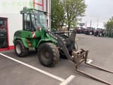 2006 Volvo L30B wheel loader, side view with pallet forks