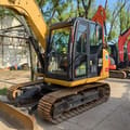 2022 Caterpillar 307E2 excavator, front three-quarter view