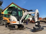 2011 Bobcat 425 mini excavator, side view