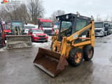1995 CASE 1825 skid steer loader, front three-quarter view