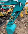 Kubota KX135 mini excavator boom and bucket detail