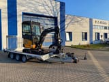 Berger Kraus BK2000NKSR mini excavator on a trailer, side view