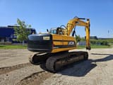 2011 JCB JS210LC crawler excavator, rear three-quarter view